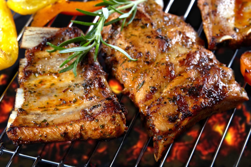 Photo of ribs on a grill.