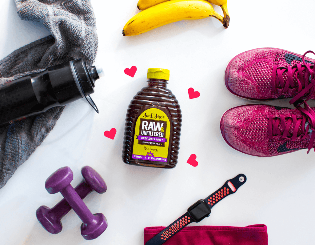 Photo of gym gear and Aunt Sue's® Raw & Unfiltered Honey.