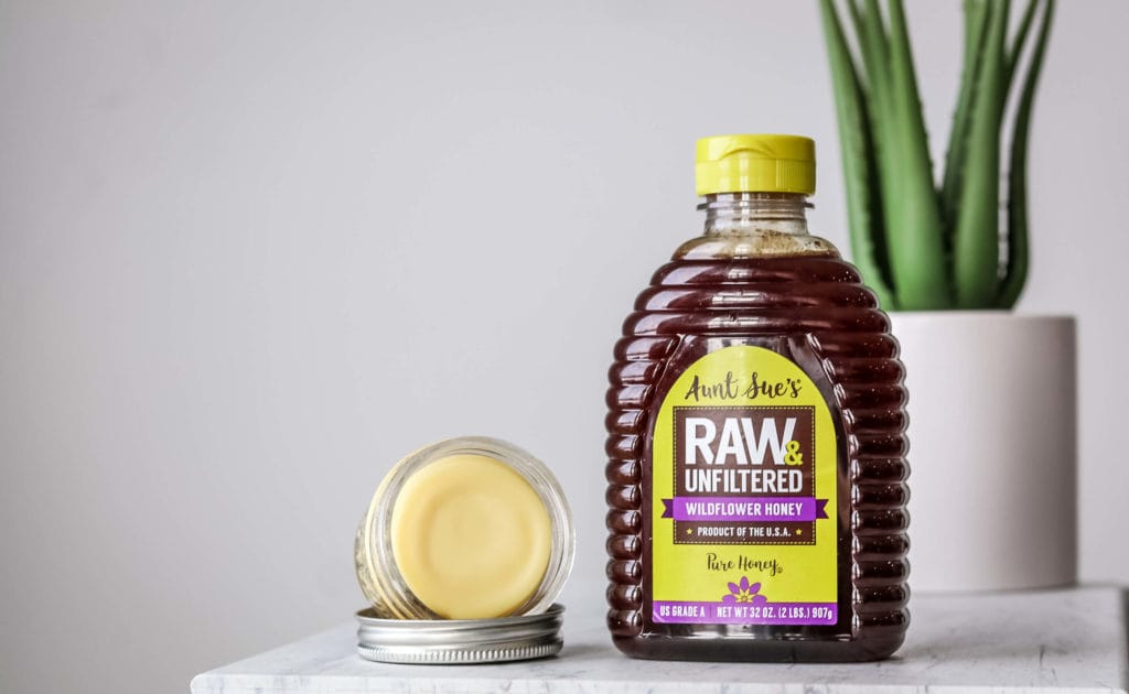 A photo of honey and dry skin balm.
