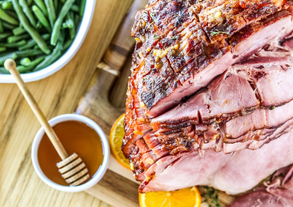 Photo of a honey ham with AUNT SUE'S® Raw & Unfiltered Honey